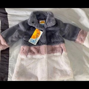 Kids size 4 faux fur coat. New condition